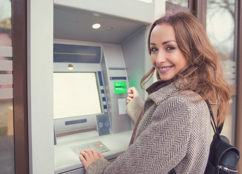 Woman using an ATM